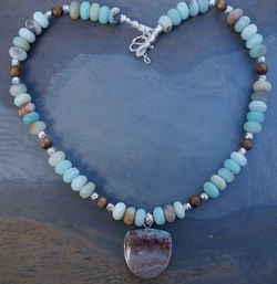 Black amazonite necklace with agate cab
